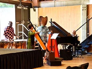 Image of four musicians