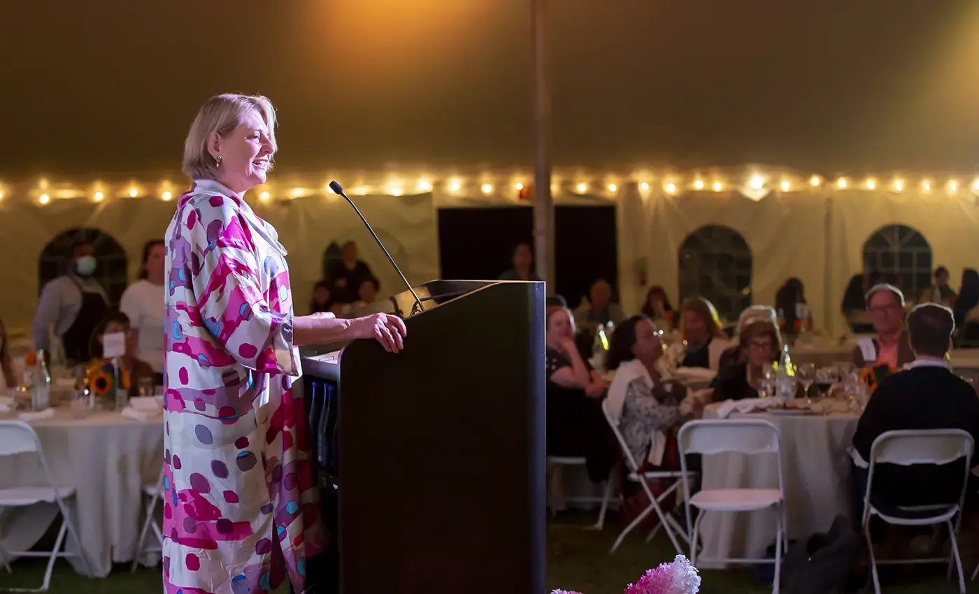 laura speaking at dinner
